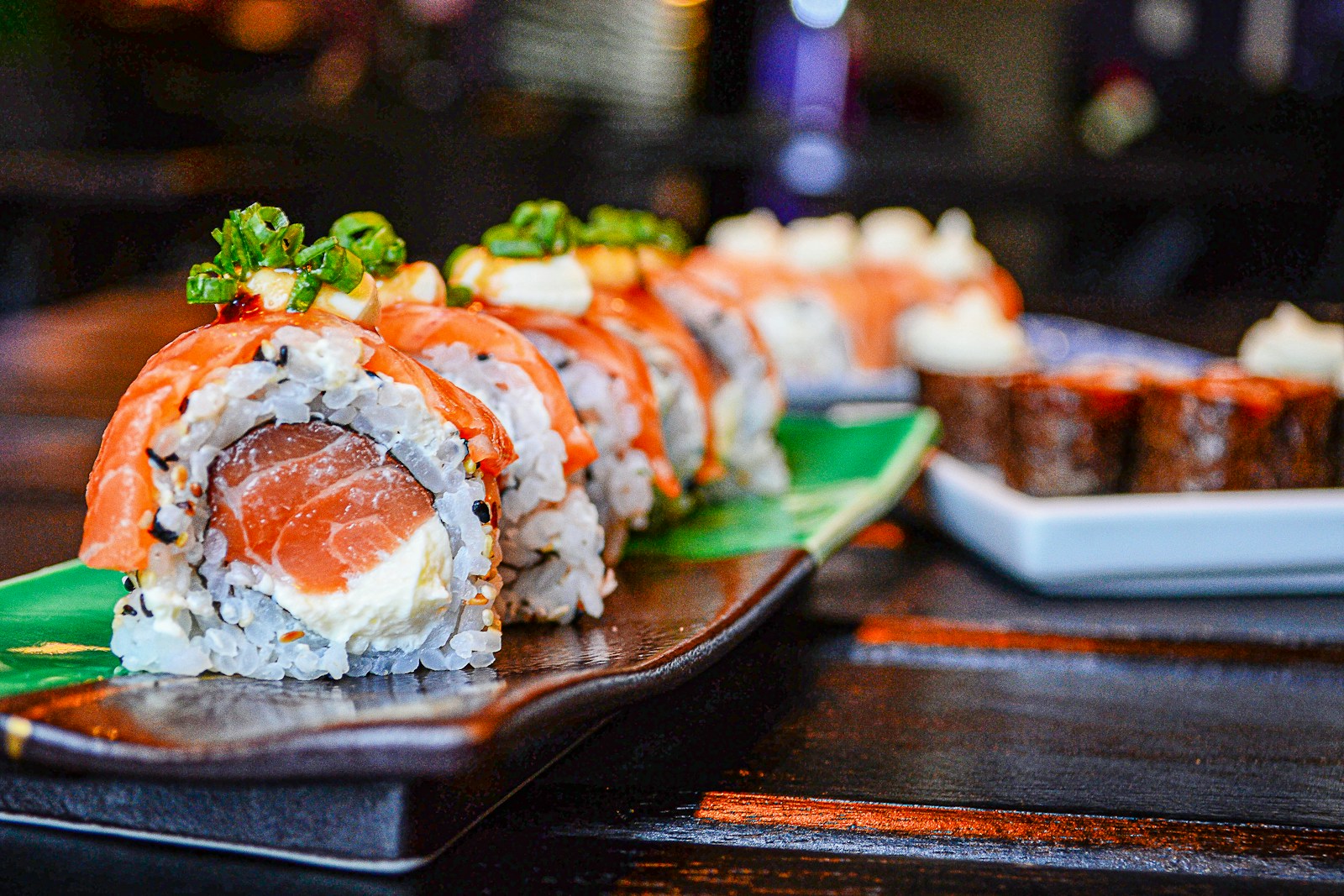 Carefully arranged Japanese sushi with fresh seafood and delicate garnishes